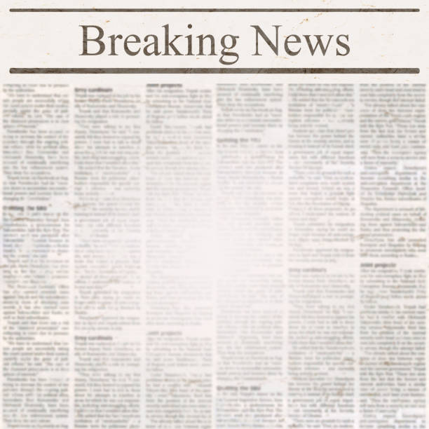 istock Newspaper with headline Breaking News and old unreadable text 1082138378