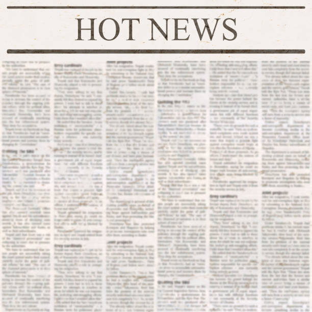 istock Newspaper with headline Hot News and old unreadable text 1082138392