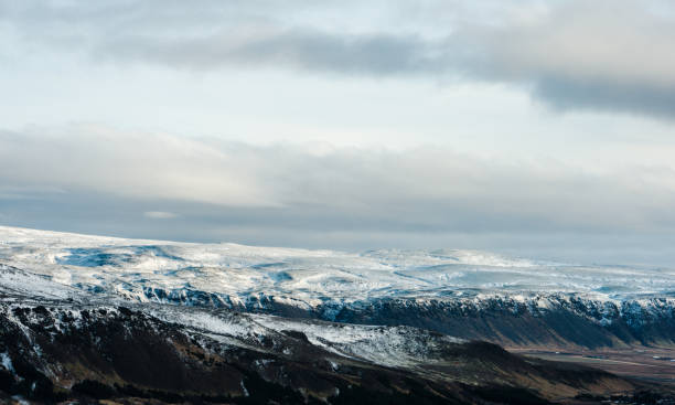 istock Snow Capped Mountains in Southern Iceland 1082146260