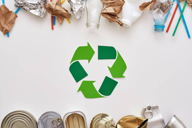 istock Save the world. Canned garbage, sorted separately near recycle symbol 1082165848