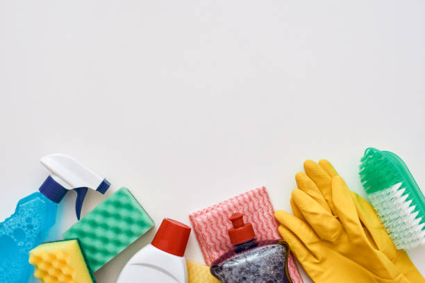 Cleaning tools. Spray bottle and other items isolated, cropped photo stock photo