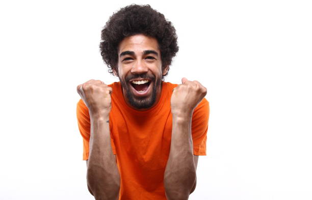 istock Beautiful afro man in orange outfit 1082175930