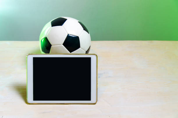 istock Digital tablet, next to soccer ball. 1082179856
