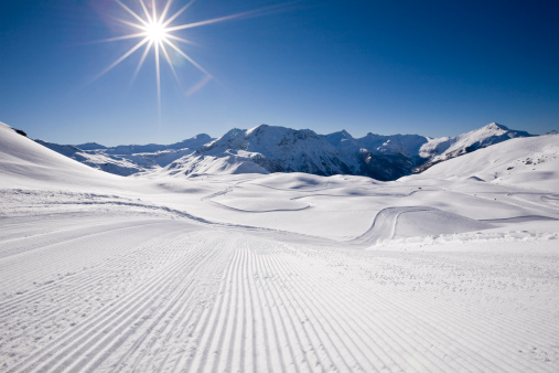 Madonna di Campiglio, Italy - February 01, 2020: Ski resort in Dolomites, Italy. Ski lifts and snowboarders