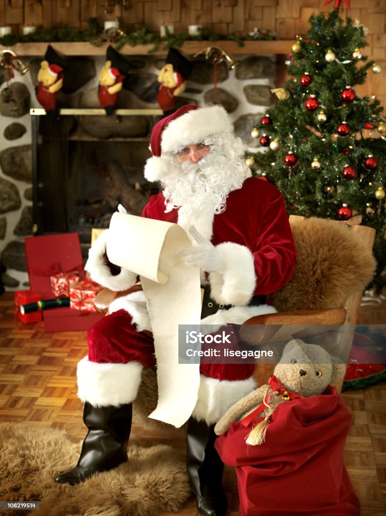 Santa con l'elenco - Foto stock royalty-free di Babbo Natale