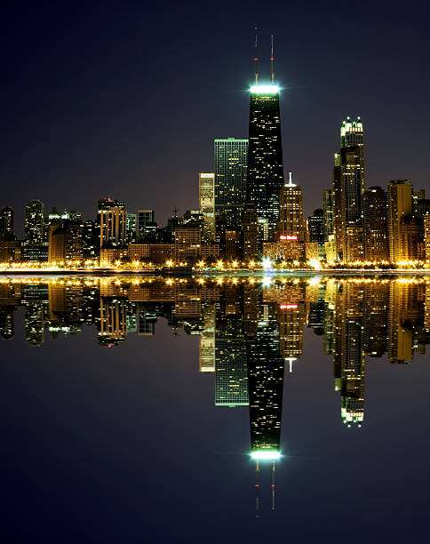 istock Chicago Skyline Reflected on Lake Michigan at Night 108219583