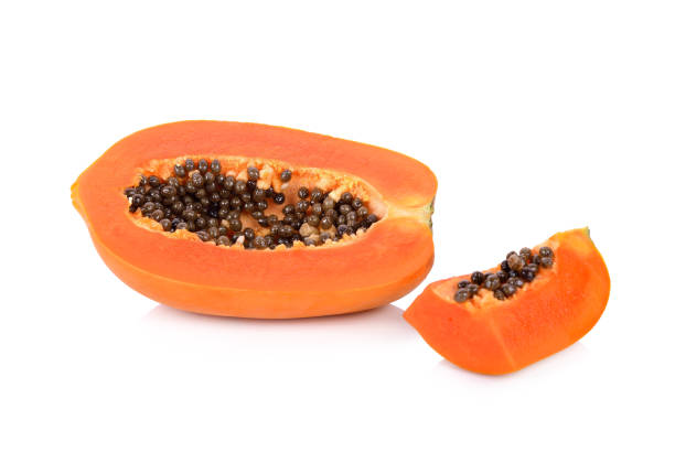 istock haft and portion cut ripe papaya with seeds on white background 1082197272