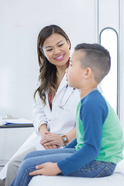 istock Young boy at the doctor's office 1082198408