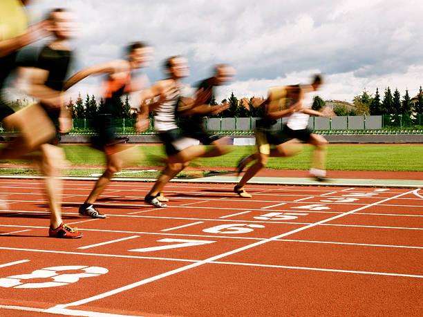 Athletes at the finish line  sports track photos stock pictures, royalty-free photos & images