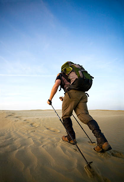 istock Man Hiking Through The Desert 108220038