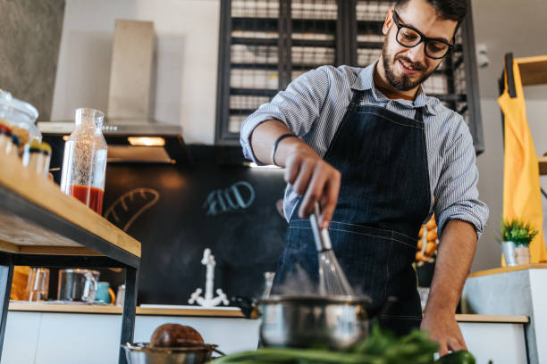 istock Ladies love a man in the kitchen 1082200566