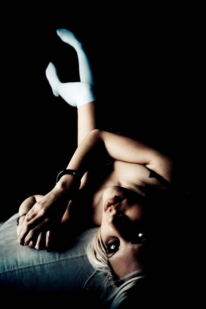 istock Handcuffed Young Woman Lying on Couch 108220165