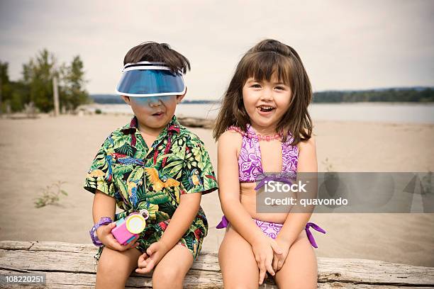Adorable Little Girl And Boy Kids In Beach Swimsuits Copyspace Stock Photo  - Download Image Now - iStock