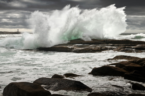 typhoon waves hitting the coast of Okinawa. Generally several times each year Okinawa gets hit with typhoons producing dangerous and dramatic ocean conditions.