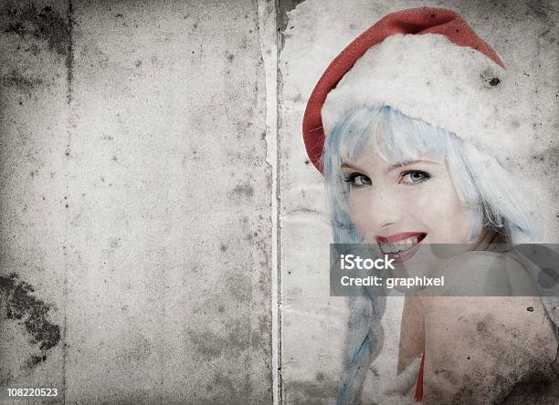 Portrait Of Woman Wearing Santa Clause Hat Stock Photo - Download Image Now - Adult, Adults Only, Beautiful People