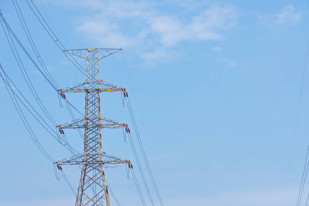 istock Electricity concept. Close up high voltage power lines station. 1082206710