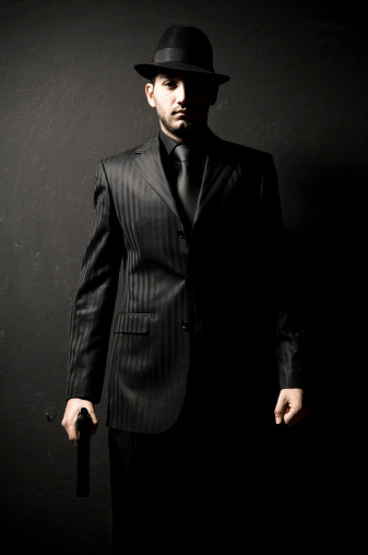 Male actor on black background
