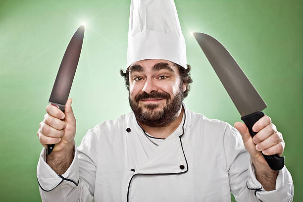 istock cook chef with knife on green 108221100