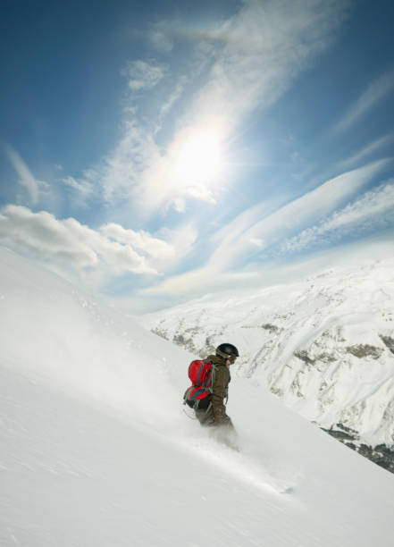 istock Snowboarding in powder snow 108221127