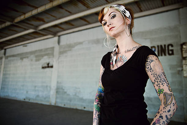 974 Tough Woman Tattoo Stock Photos, Pictures & Royalty-Free Images - iStock