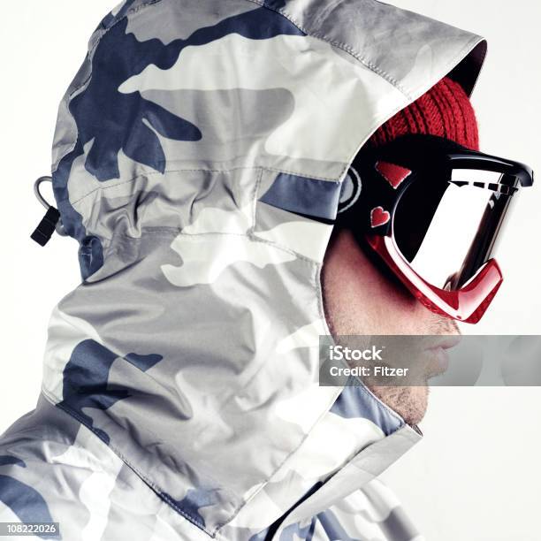 Snowboarder Wearing Camo Jacket And Goggles Isolated On White Stock Photo - Download Image Now