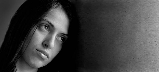 istock pensive young woman 108222105