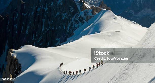 Group Of People Climbing Snow Covered Mountain Stock Photo - Download Image Now - Climbing, Mont Blanc, Aerial View