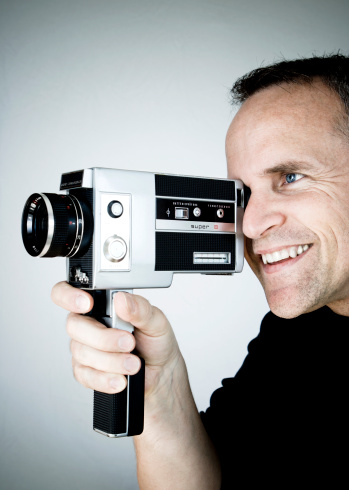 photographer in the computer monitor isolated on white