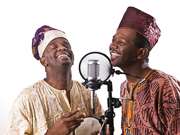 West African Musicians Singing and Laughing