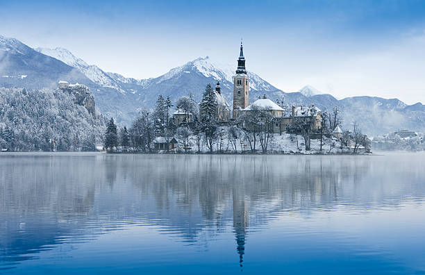 Lake Bled located in Slovenia Europe. There is a church on the island and old castle on a rock above the lake.