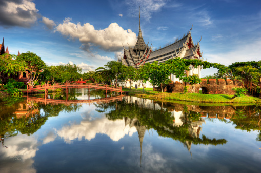A couple of men and women visit Wat Sa Sit, Sukhothai old city, Thailand. Ancient city and culture of south Asia Thailand, Sukothai historical park
