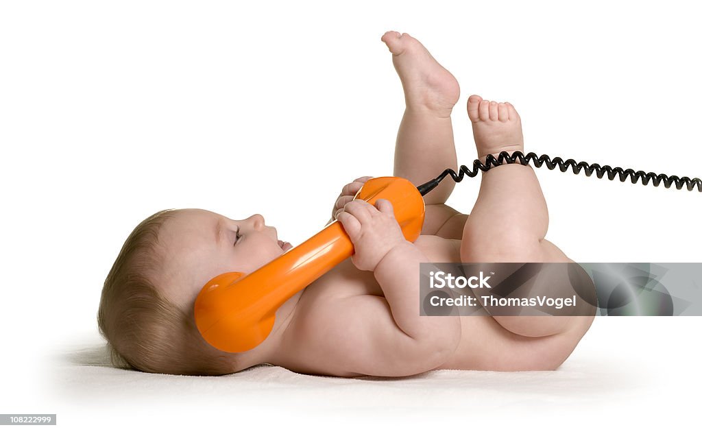 Bebê no telefone. Telefone criança bonito nu isolado - Foto de stock de Telefone royalty-free