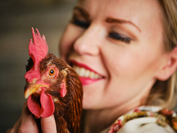 istock Traditional Dressed Russian Woman with Rooster 1082230192