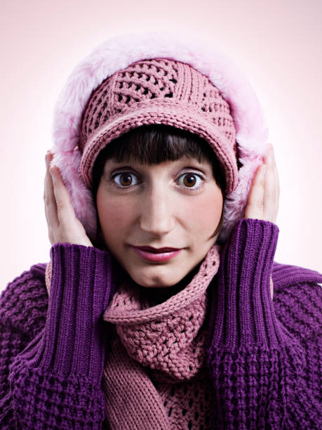 istock Young Woman Wearing Winter Hat and Earmuffs 108223036