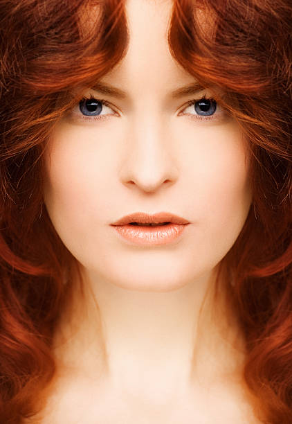 istock red hair woman`s portrait 108223096
