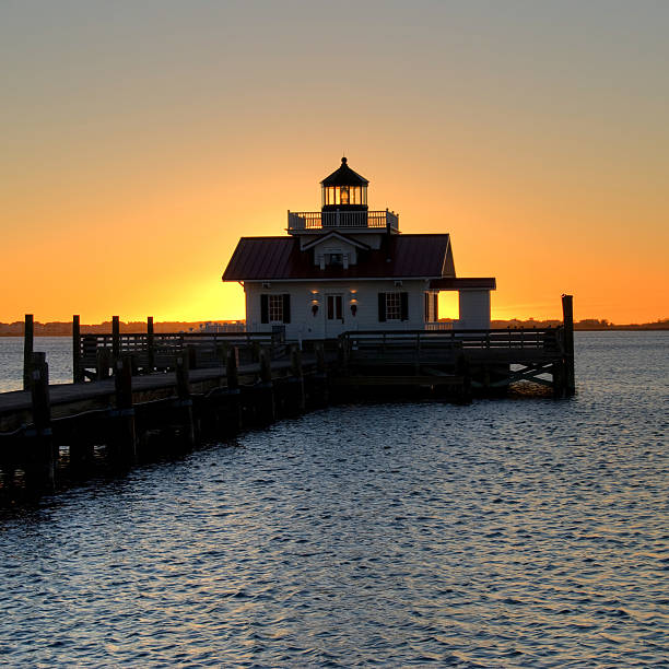 istock Manteo Lighthouse on Dock at Sunrise 108223229