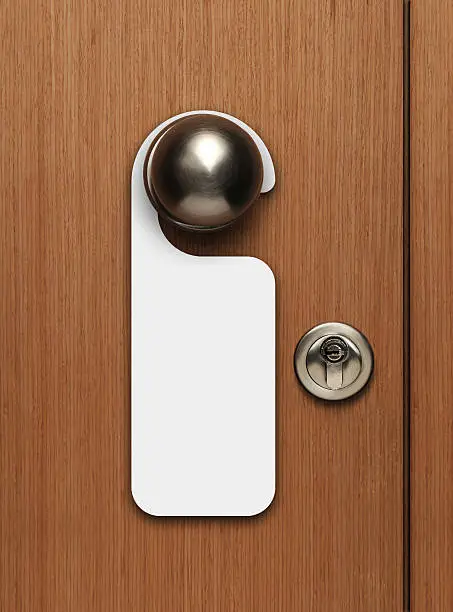 Photo of Blank door sign hanging from knob