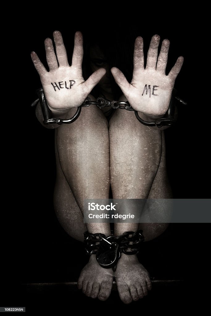 A escravatura e o tráfico de seres humanos - Foto de stock de Tráfico humano royalty-free