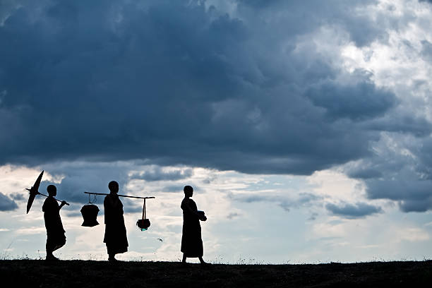 Buddhist monks Buddhist monks with alms bowl dalai lama stock pictures, royalty-free photos & images