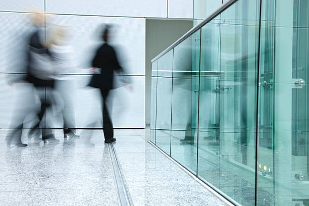 istock Businesswomen Walking in Modern Office Building 108223515