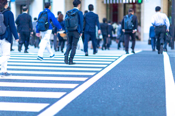 istock business man walking on the street 1082235546