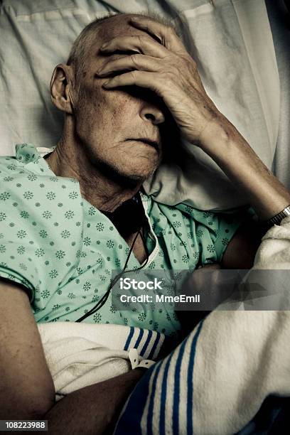 Tired And Sick Senior Man Lying In Hospital Bed Stock Photo - Download Image Now - Cancer - Illness, Exhaustion, Hospital