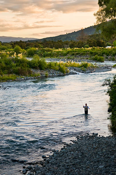 フライフィッシング - fly fishing fishing river fisherman ストックフォトと画像