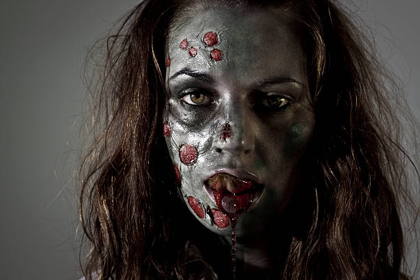 Zombie Licking Lips zombie licking lip grotesque stock pictures, royalty-free photos & images