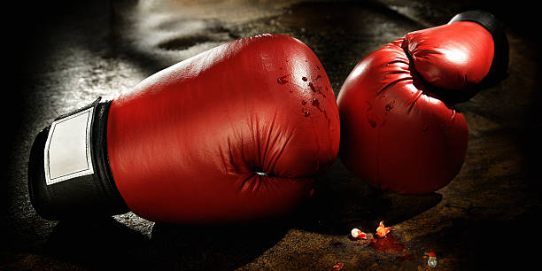 istock boxing gloves with bloody teeth in front 108224361