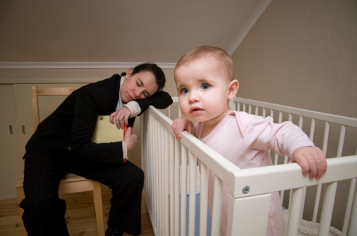 tired mom with baby that won't sleep