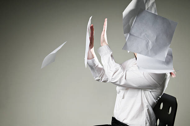 istock Woman Being Hit with Paper 108224671