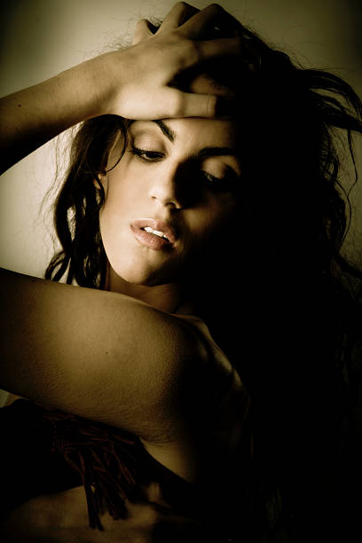 istock Young Woman Posing, Low Key 108225171