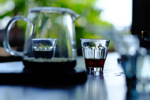 istock A cup of espresso shot coffee on wood table background 1082253714