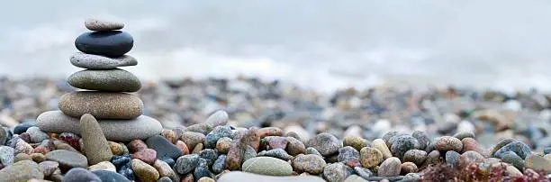 Photo of Stacked stones with beautiful arrangement of colors 